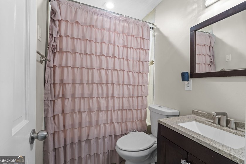 Welcome to this inviting end-unit townhome nestled in the highly - photo 25