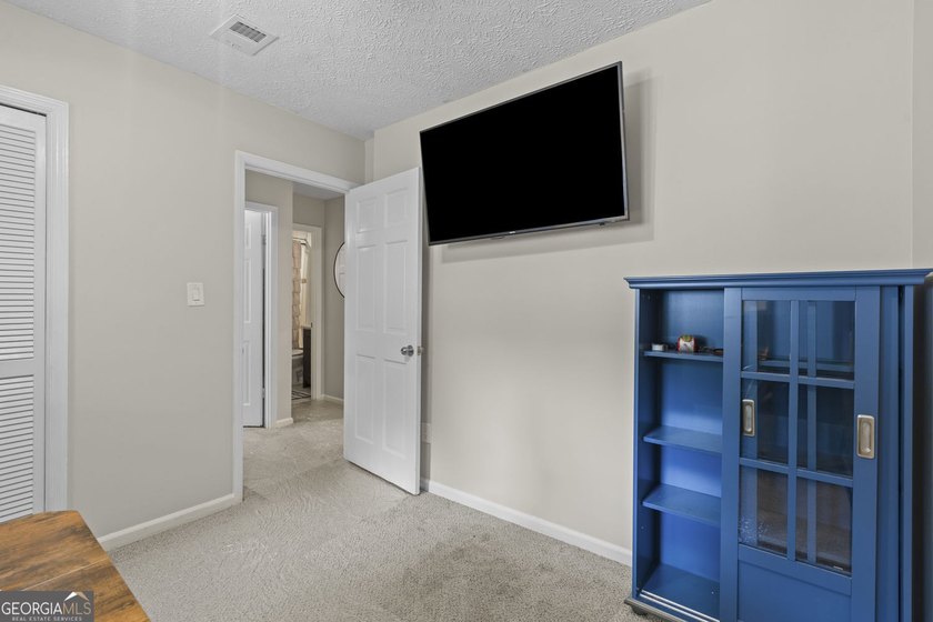 Welcome to this inviting end-unit townhome nestled in the highly - photo 27