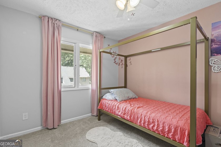 Welcome to this inviting end-unit townhome nestled in the highly - photo 28