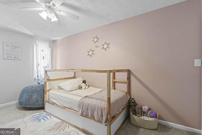 Welcome to this inviting end-unit townhome nestled in the highly - photo 35