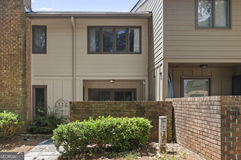 Welcome to this inviting end-unit townhome nestled in the highly - photo 41