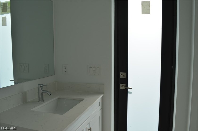 Embrace luxury living in this brand new single-family home in - photo 15