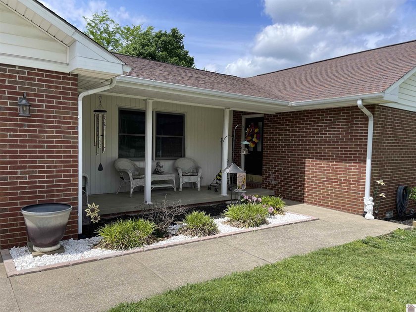 Welcome to beautiful 401 Centennial Drive: a spacious brick - photo 5