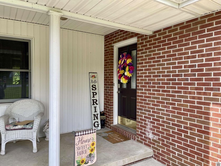 Welcome to beautiful 401 Centennial Drive: a spacious brick - photo 6
