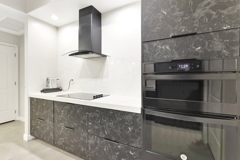 Experience unparalleled luxury in the heart of downtown City - photo 12