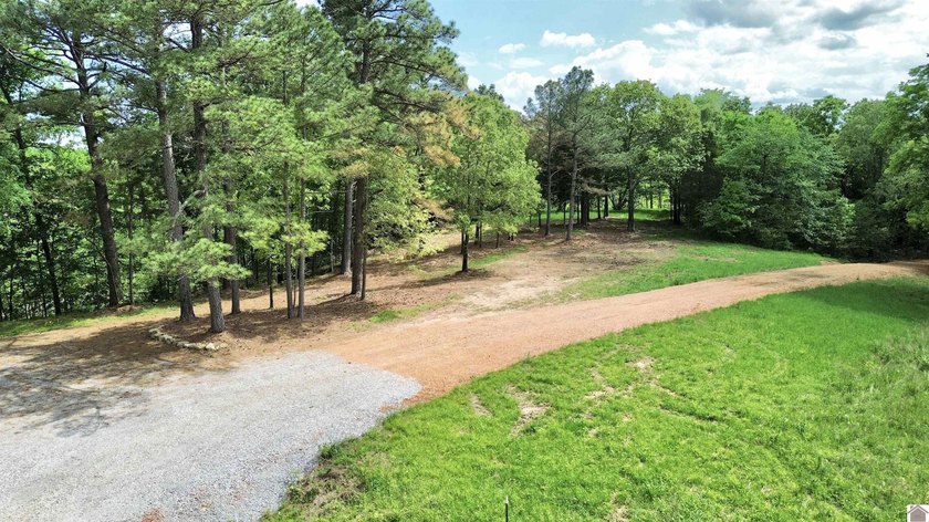 This 18-acre tract of rolling, wooded land just minutes from - photo 5
