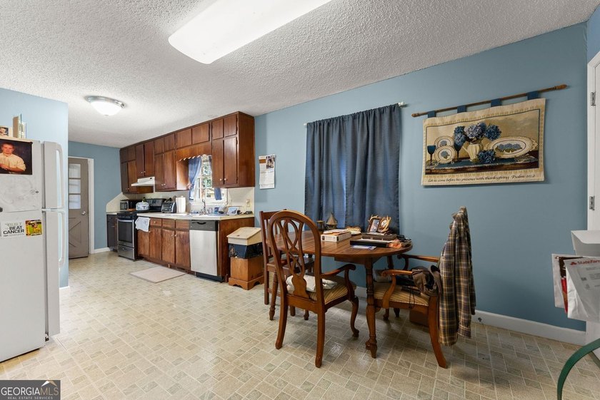 Discover the possibilities with this charming brick ranch - photo 13