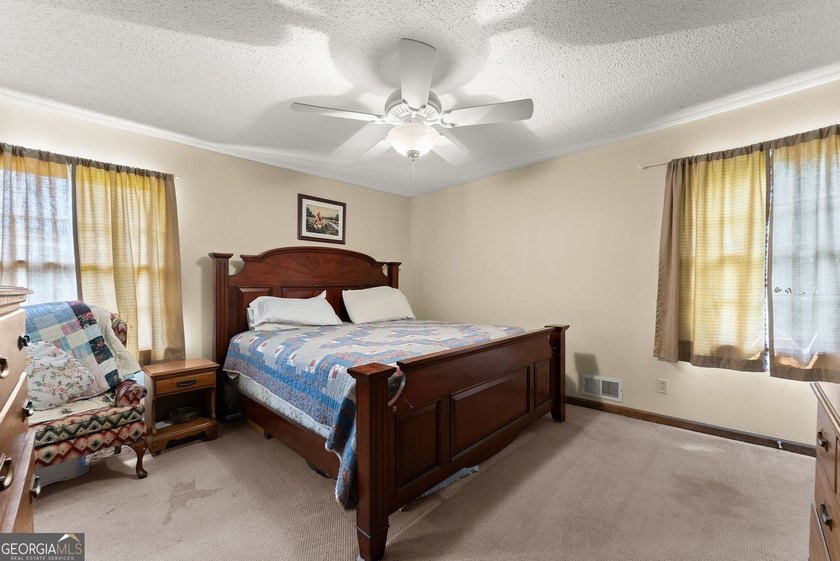 Discover the possibilities with this charming brick ranch - photo 16