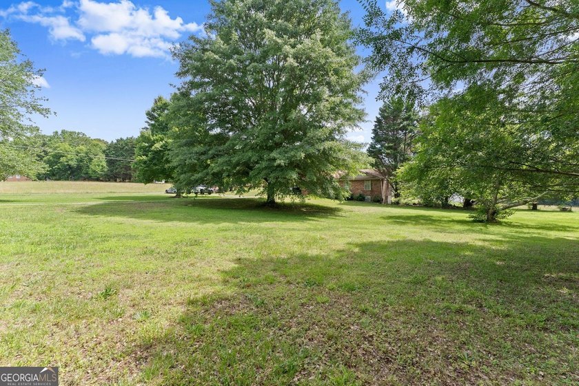 Discover the possibilities with this charming brick ranch - photo 18