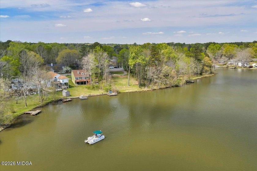 Discover a rare opportunity to own a premier lakefront homesite - photo 18