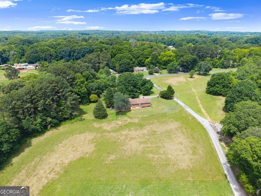 Discover the possibilities with this charming brick ranch - photo 22