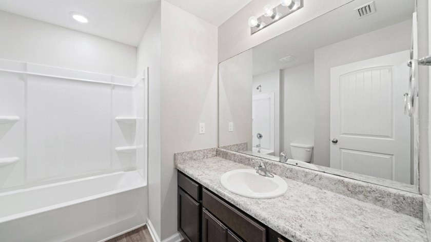 Welcome to a beautifully maintained 4-bedroom, 2-bath home in - photo 29