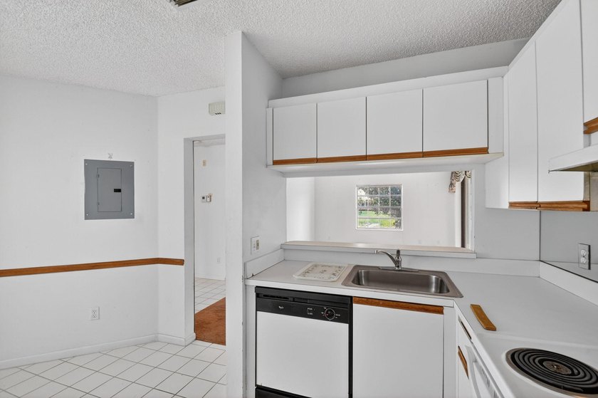 Create your own masterpiece in this spacious first floor lake - photo 14