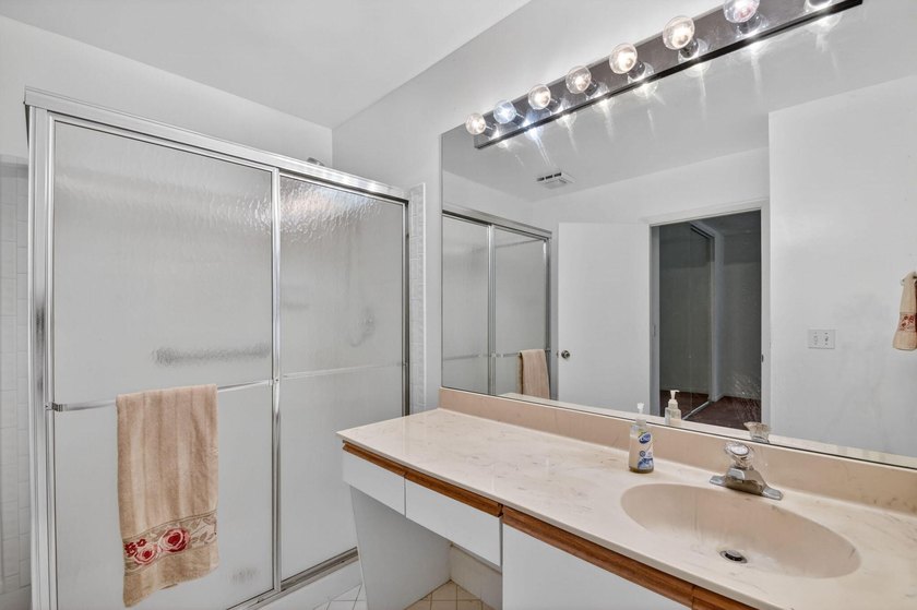 Create your own masterpiece in this spacious first floor lake - photo 16