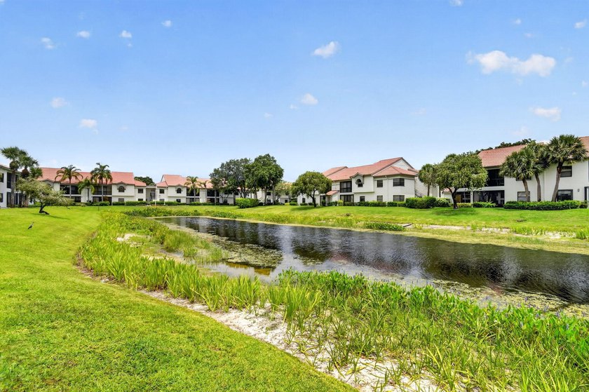 Create your own masterpiece in this spacious first floor lake - photo 21
