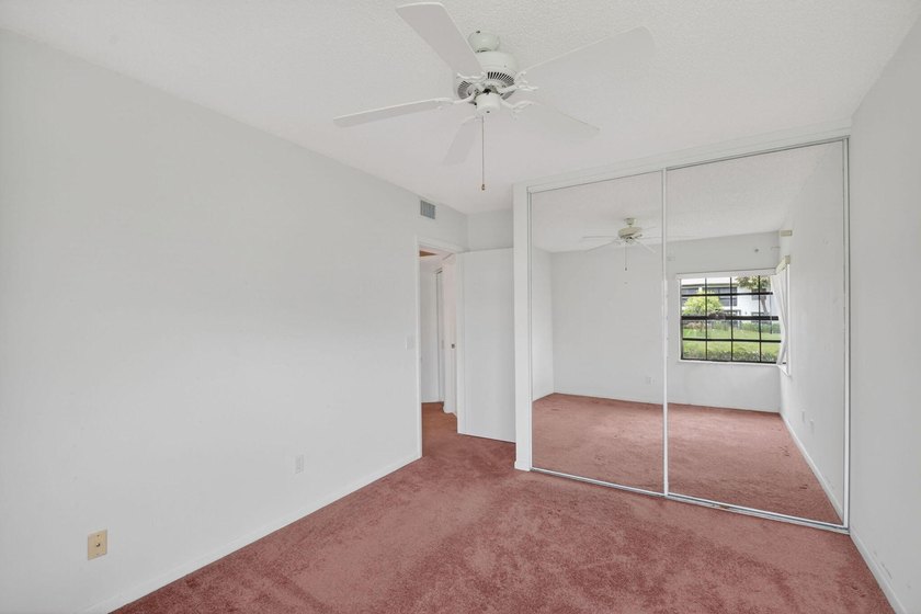 Create your own masterpiece in this spacious first floor lake - photo 26