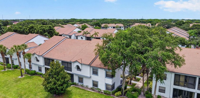 Create your own masterpiece in this spacious first floor lake - photo 30