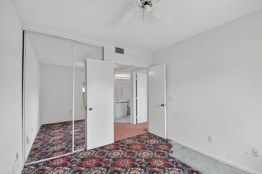 Create your own masterpiece in this spacious first floor lake - photo 31