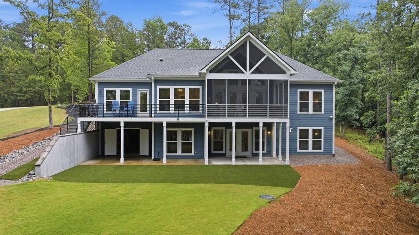 Built just three years ago, this stunning custom lakefront home - photo 50
