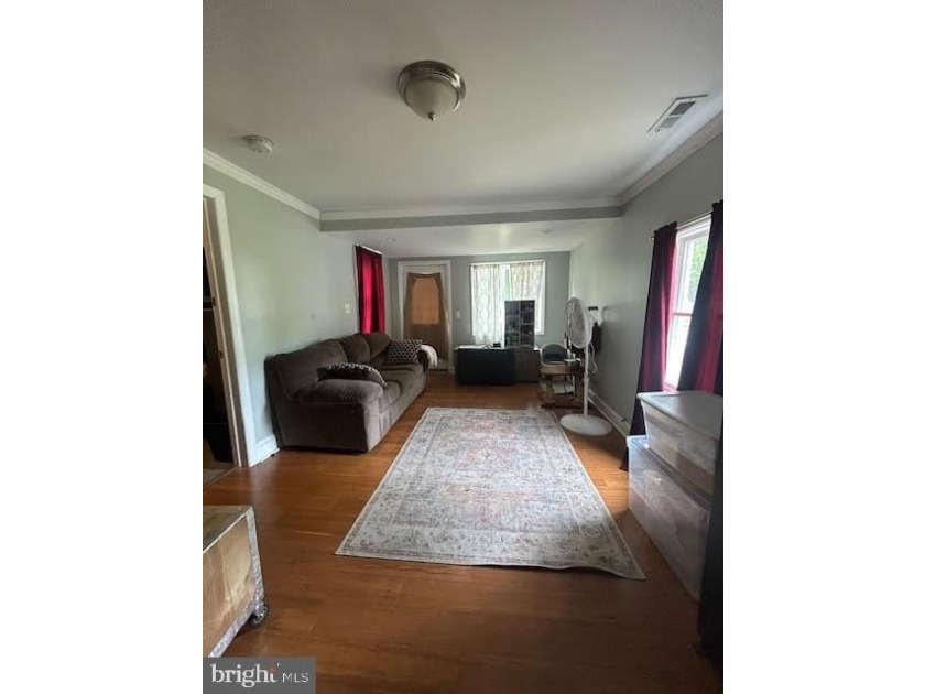 3 Bedroom 1 bath ranch home features a spacious living room - photo 12