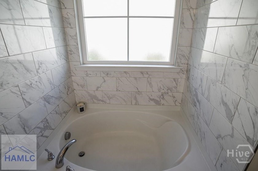 Located in the gated community of The Enclave in Savannah, this - photo 14