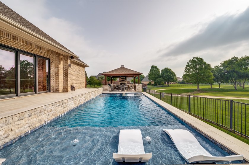 Experience refined luxury living in this exquisite 4-bedroom, 3 - photo 29