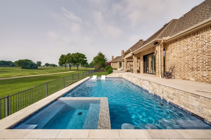 Experience refined luxury living in this exquisite 4-bedroom, 3 - photo 30