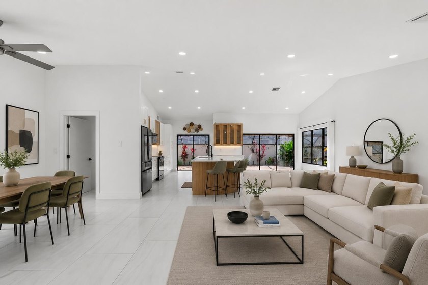 Welcome to refined living in this impeccably upgraded 3-bedroom - photo 2
