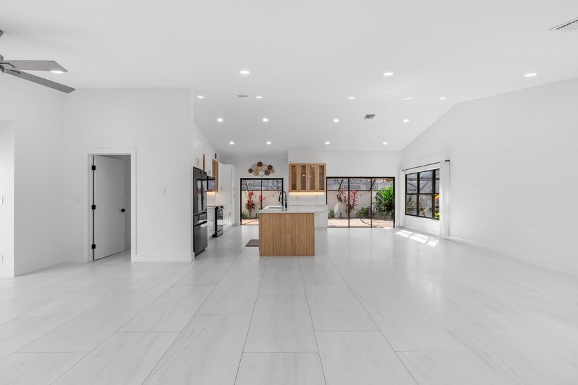 Welcome to refined living in this impeccably upgraded 3-bedroom - photo 3