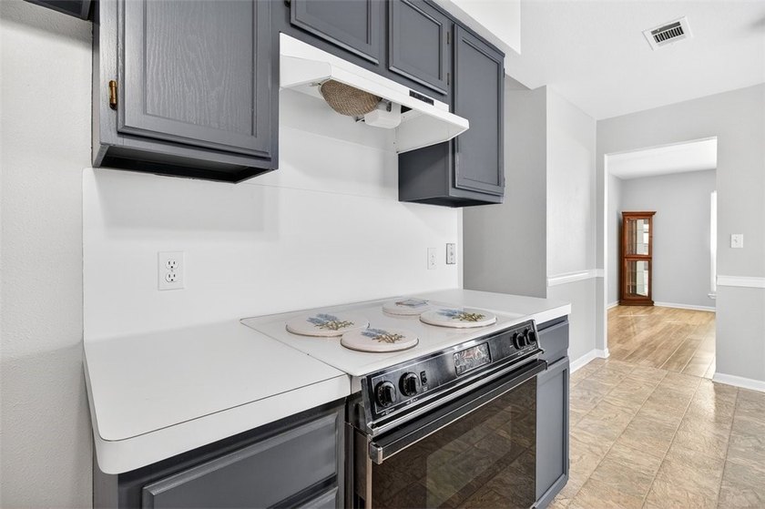 WELL CARED FOR all brick home on large tree shaded lot with new - photo 14