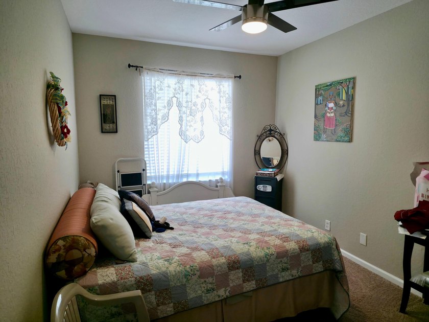This two-story residence offers a functional 4-bedroom - photo 14