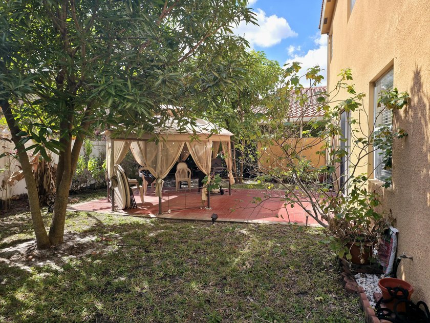 This two-story residence offers a functional 4-bedroom - photo 16