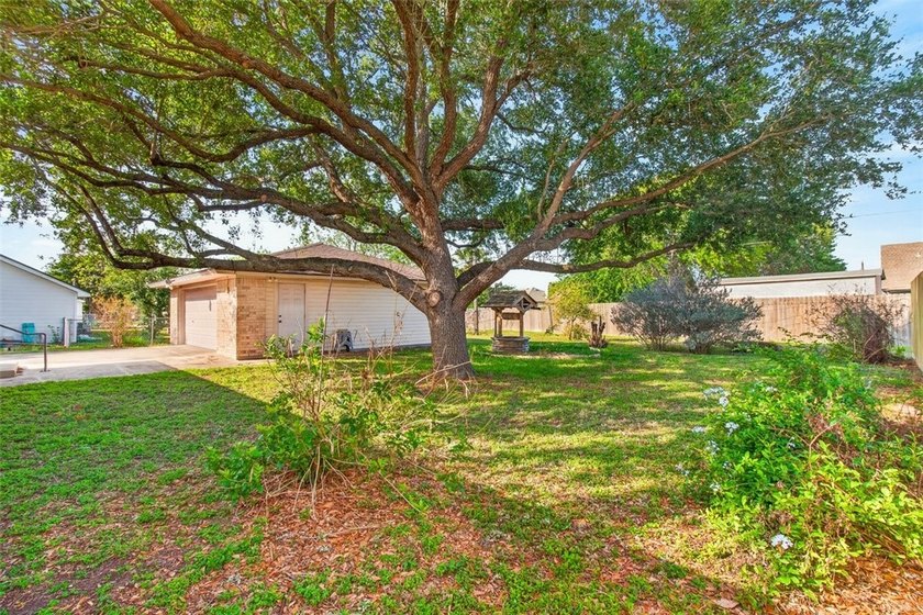 WELL CARED FOR all brick home on large tree shaded lot with new - photo 39