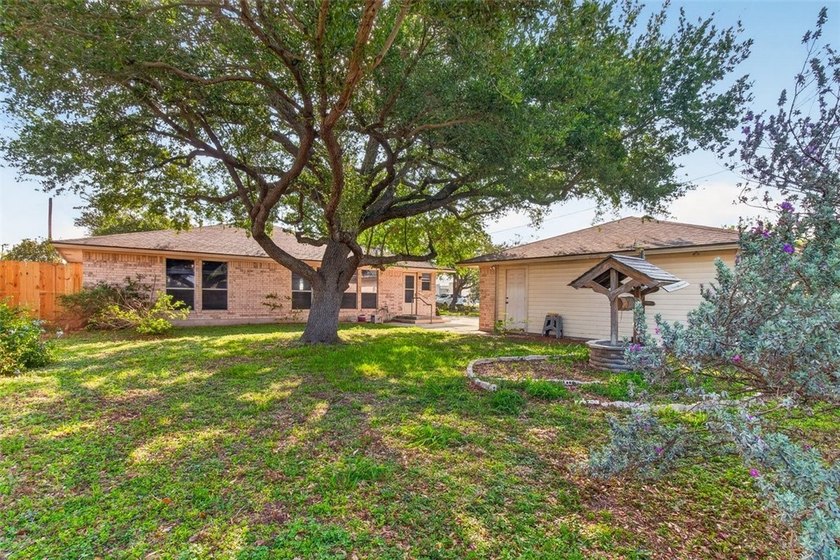 WELL CARED FOR all brick home on large tree shaded lot with new - photo 40