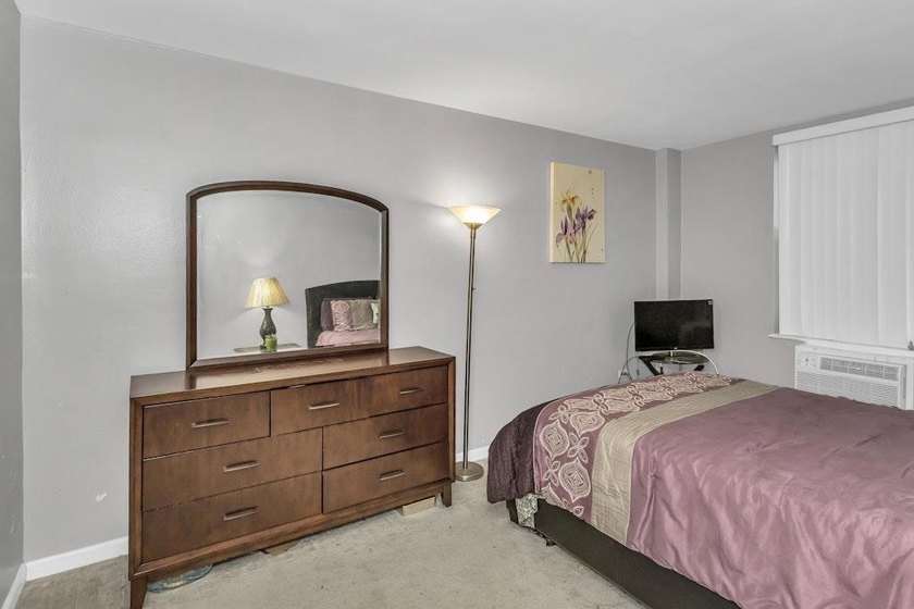 Discover modern living in this stylish two-bedroom, one and a - photo 15