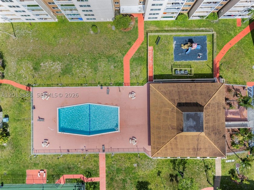 Bright 1-bedroom condo in Coral Gate East Condominium featuring - photo 22
