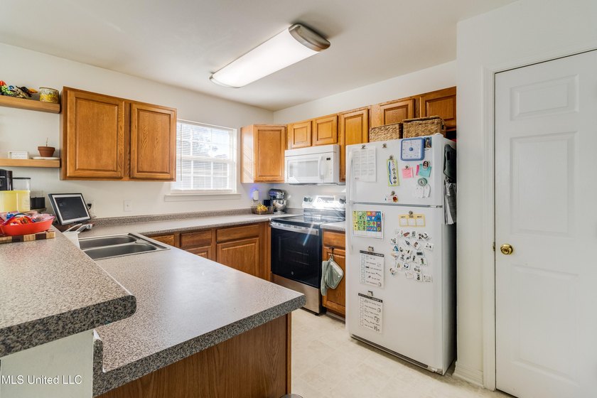 Step into a home that checks every box--style, space, and - photo 5