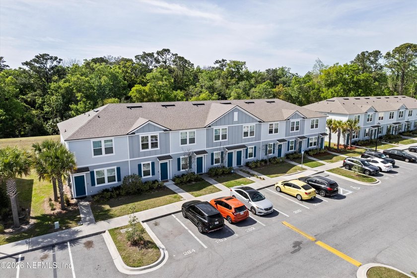 Rivergate is a D.R. Horton townhome community located in the - photo 2