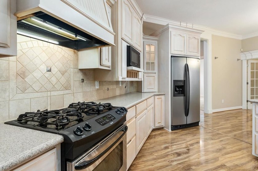 Experience a life of luxury at this gorgeous golf course home - photo 16