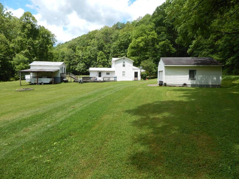 This old 1900's farm house will take you back in time and you'll - photo 3