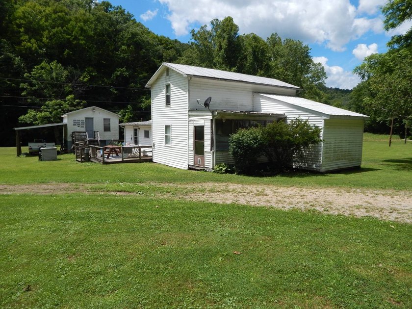This old 1900's farm house will take you back in time and you'll - photo 6