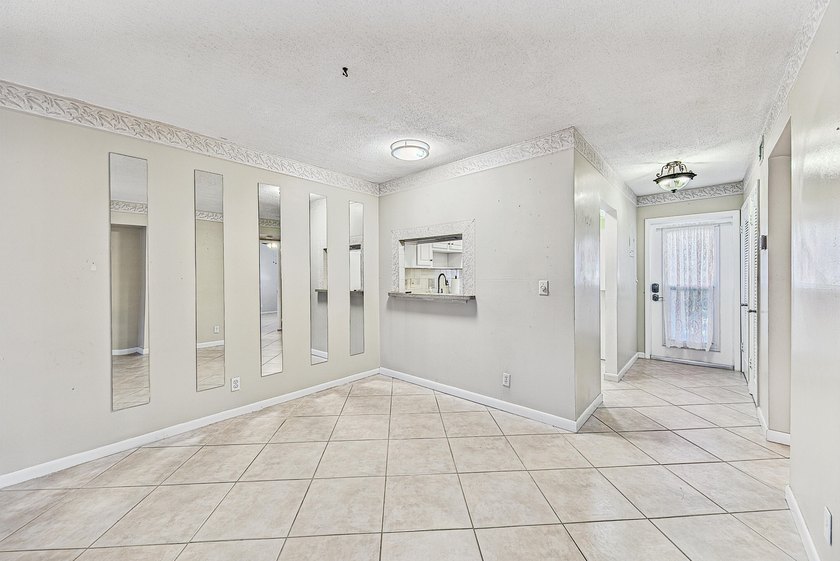 LOVELY EAST FACING UPDATED 2/2 second floor garden view unit in - photo 11