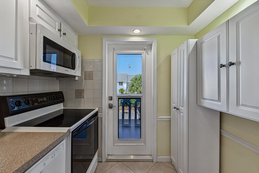 LOVELY EAST FACING UPDATED 2/2 second floor garden view unit in - photo 14