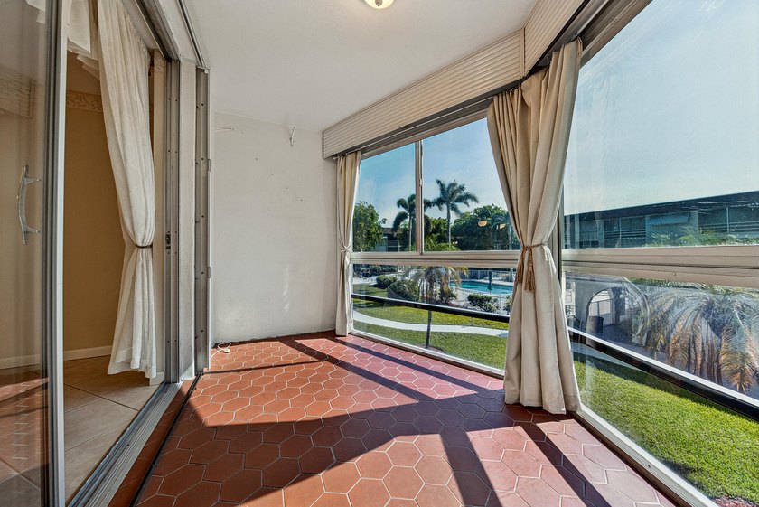 LOVELY EAST FACING UPDATED 2/2 second floor garden view unit in - photo 16
