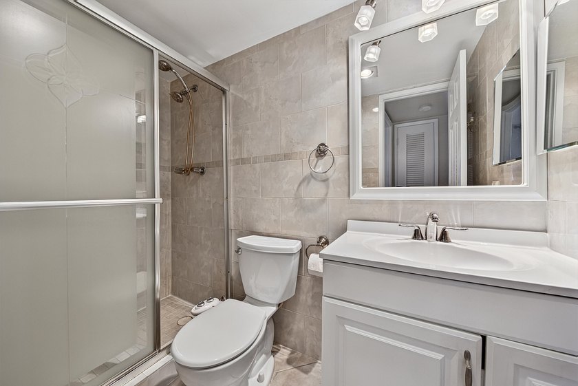 LOVELY EAST FACING UPDATED 2/2 second floor garden view unit in - photo 23