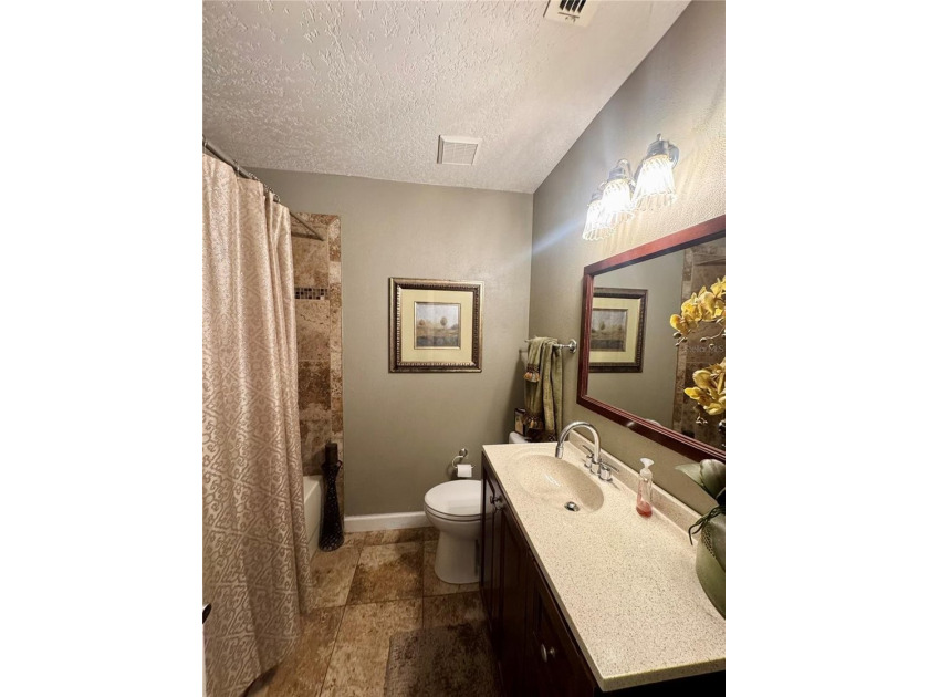 JUST REDUCED! This UNIQUE CUSTOM BUILT LAKEFRONT HOME IS LOCATED - photo 25