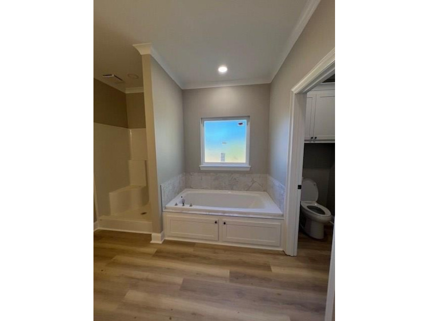 ON THE WATER!!! This beautiful new construction home offers a - photo 6