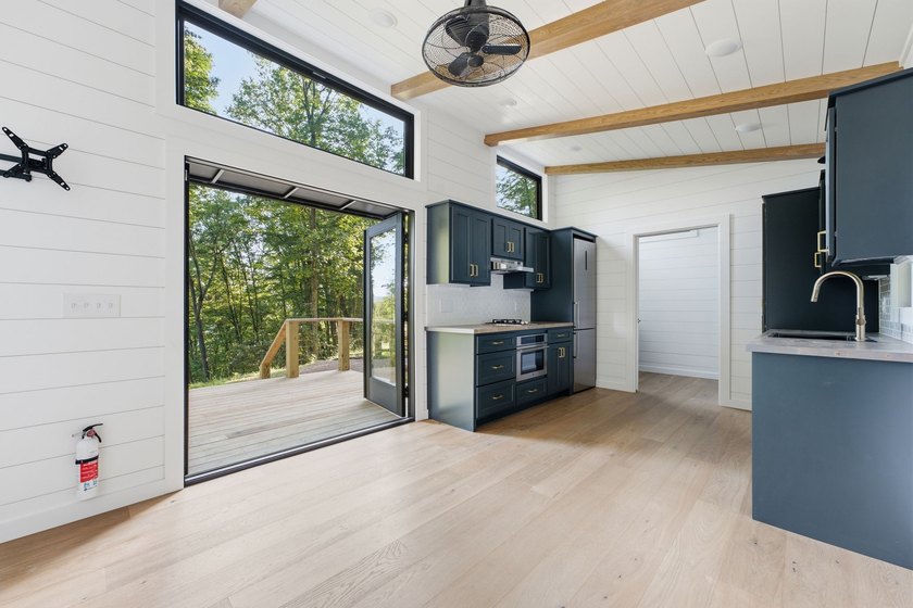 Perched on 1.12 private acres, this custom-built Timbercraft - photo 14