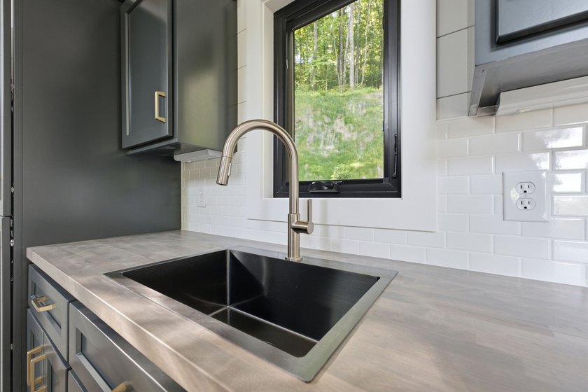 Perched on 1.12 private acres, this custom-built Timbercraft - photo 21