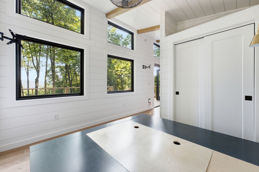 Perched on 1.12 private acres, this custom-built Timbercraft - photo 27